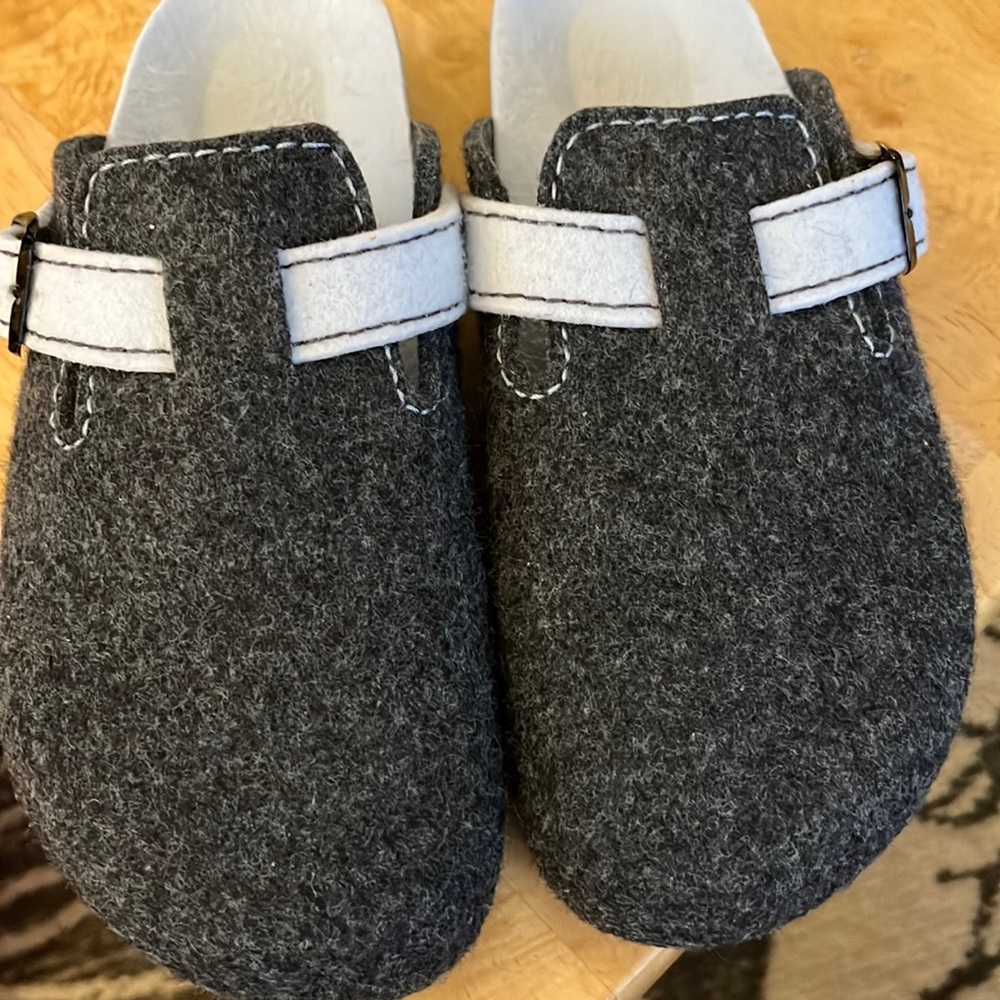 On hold.       Mandèl very similar to Birkenstock Wool clogs/slippers.